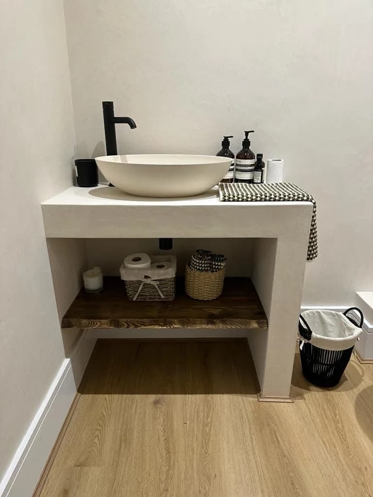 Chelsea I: bathroom with a stone vanity, a countertop basin and a matt black tap